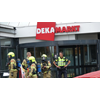 Winkelcentrum ontruimd na brandmelding bij Dekamarkt in Andijk