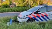 Politieauto crasht in Zwaag