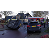 Auto op de zijkant na ongeval in Hoogkarspel